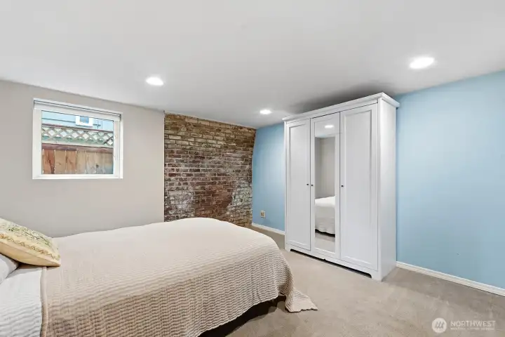 4th bedroom is in the basement with a legal window for ingress/egress and an armoire that's included.