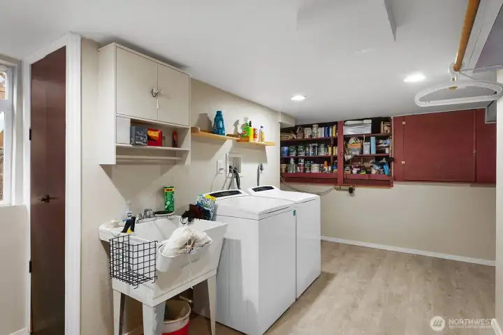 Laundry room and storage area in the basement.