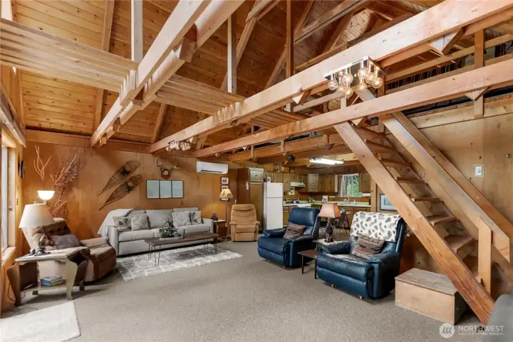 Comfortable living space with cozy seating area, rustic décor accents, and a true lodge-style feel in the heart of the home.