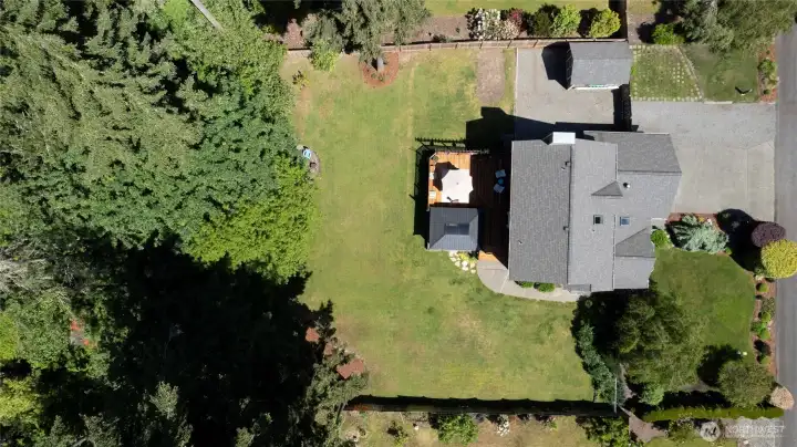 Drone shot of this Beautiful Home and yard.