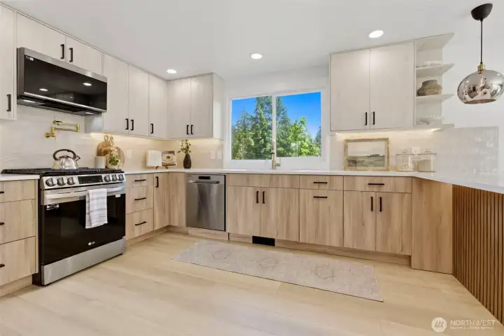 open concept kitchen with updated cabinetry open concept kitchen with updated cabinetry