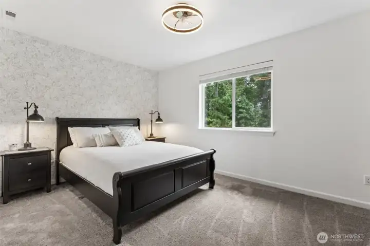 Bedroom with walk-in closet