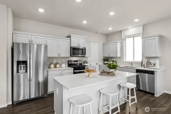 Beautiful modern kitchen space. Actual home is under construction. Colors, materials, and features may vary. See site agent for details. Beautiful modern kitchen space. Actual home is under construction. Colors, materials, and features may vary. See site agent for details.