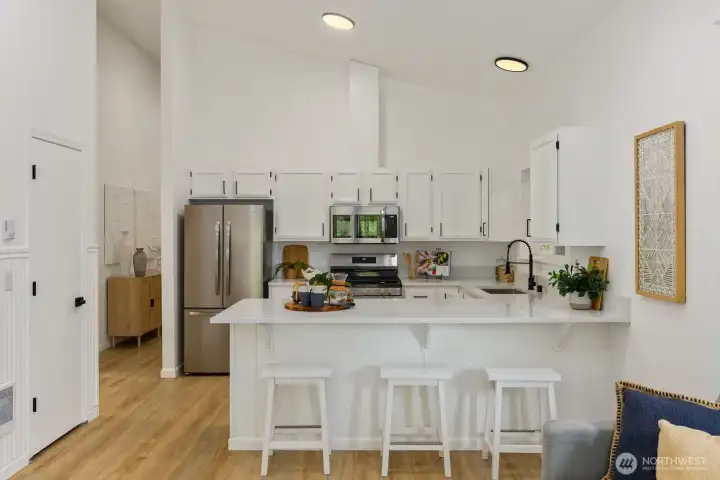 Ample cabinetry and counter space make this kitchen as practical as it is stylish. Ample cabinetry and counter space make this kitchen as practical as it is stylish.