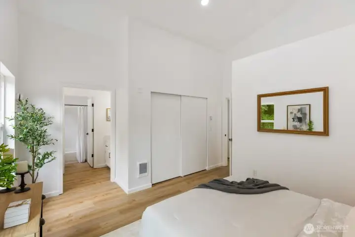 A spacious closet with sliding doors offers abundant storage just off the bedroom. A spacious closet with sliding doors offers abundant storage just off the bedroom.