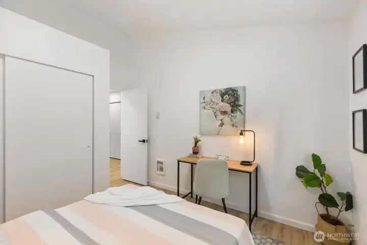 A versatile room featuring a built-in desk nook, ideal for a home office or reading corner. A versatile room featuring a built-in desk nook, ideal for a home office or reading corner.