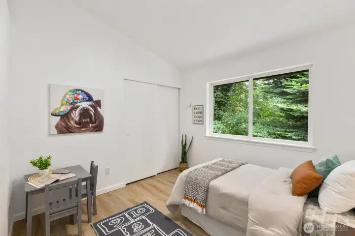 Light and airy with a large window framing the wooded backyard view. Light and airy with a large window framing the wooded backyard view.