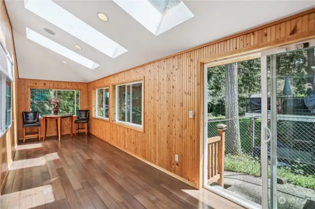 Large sun room off the main floor kitchen.