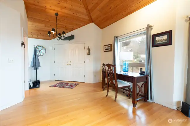 Spacious entry with double doors and desk area