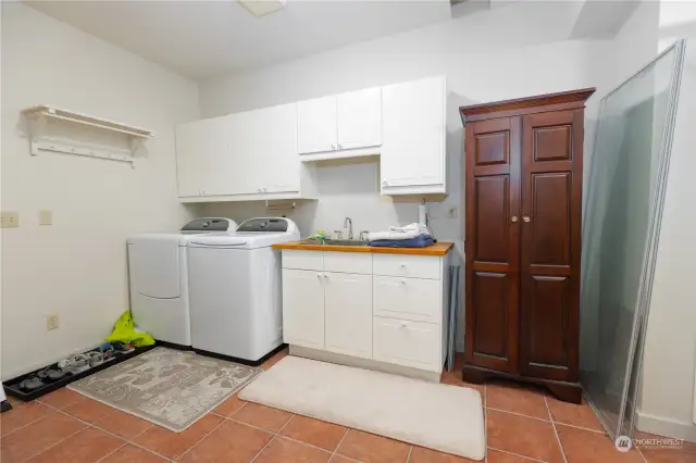 Large utility room with room to expand and a separate outdoor entrance