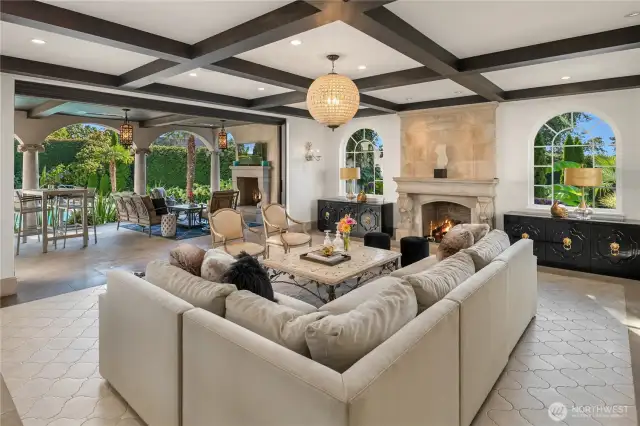 Now you can truly see how this space is so incredible Casual, inviting and yet and the same time...WOWZA! There are nana-wall doors that open to the covered patio with zero threshold (they hang off of a large I-beam). There are 4 lovely wall sconces and an art deco style chandelier in the family room. Did I mention that there is a 19 zone Sonus system in the home-so, is you want music at your parties-not a problem!