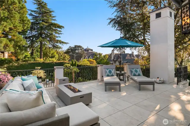 The upper patio off of the bonus room. You can see the beginning of the curved staircase that leads to the lower level to the right in this photo.