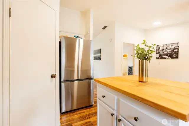 Large walk-in pantry and large butcher block island