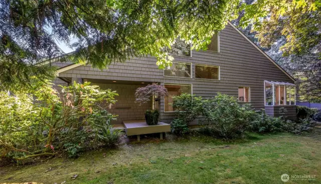Tucked away on a private cul-de-sac, this Avant Place home is flooded with natural light from a multitude of windows and skylights that illuminate the spaces thru out the day