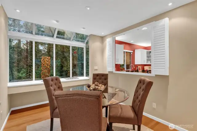 Pass thru window from the kitchen-potential to remove upper walls and create an eating bar or extra seating and serving