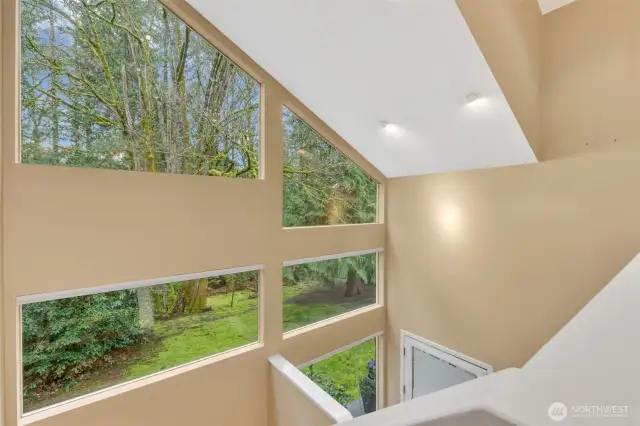 The bevy of windows thru-out the home capture natural light around the clock