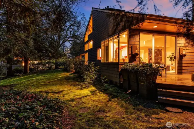 Surrounded by deep, wooded greenbelt and wrapped in privacy, the 1985-built, two-story offers timeless style accented by vaulted ceilings and open spaces