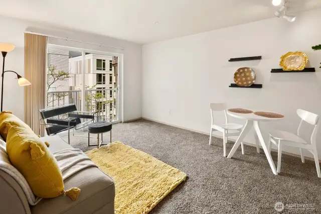 Juliette balcony, open to listen to birds singing. Room for office or large TV