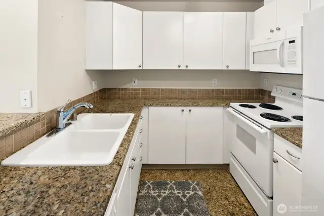 plenty of space in the kitchen and cupboard space