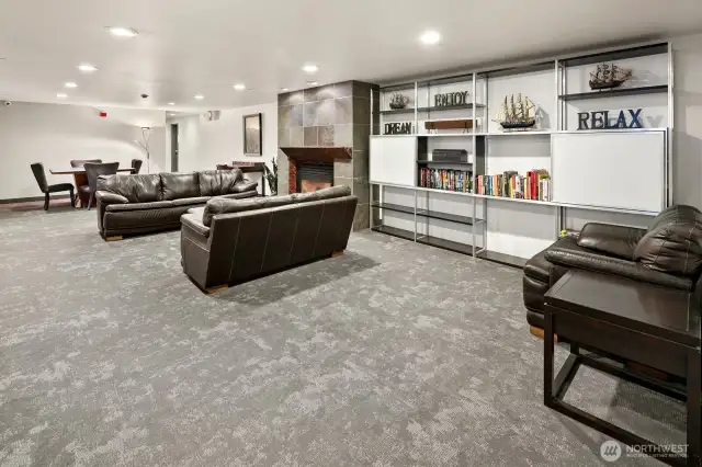 Lower level lobby living room, dining room and library