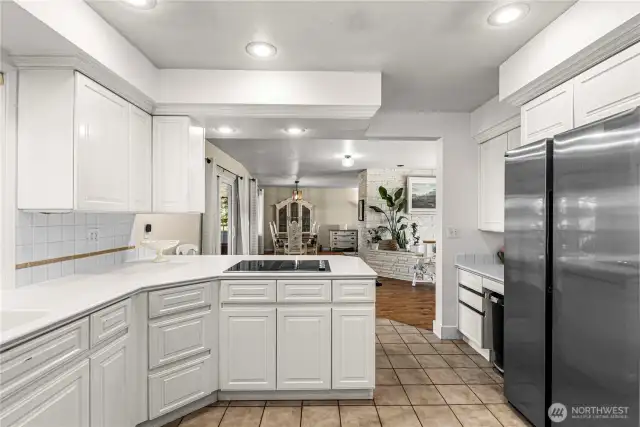 Kitchen with walk in pantry looking toward dining area. Views of the foothills