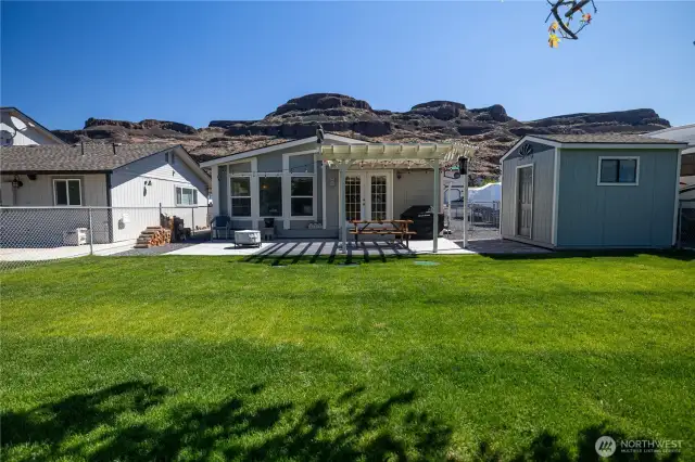 Perfectly manicured back yard for all the summer time bbq's!