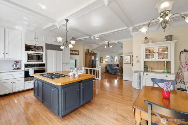 Subzero fridge, gas cooktop, convection microwave. Good for one or many! The door in the center of the picture leads to the 3 car garage and unfinished loft space.