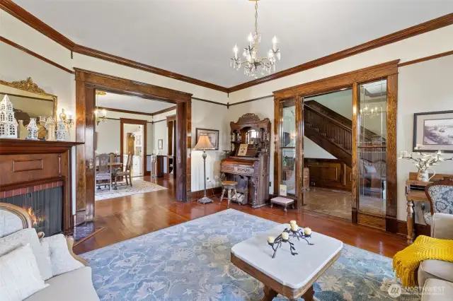 Pocket doors between the living room and dining room create privacy and add to the charm of the home.