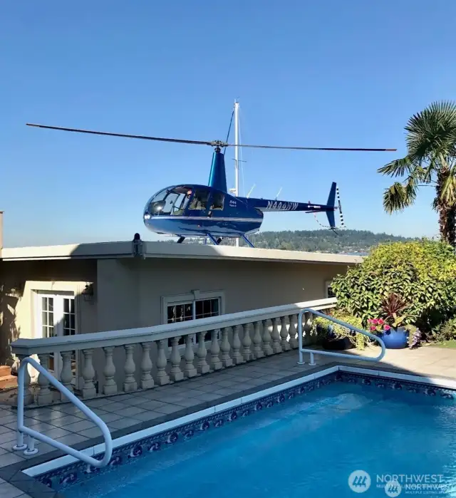 Helipad on boathouse holds up to a Bell 206