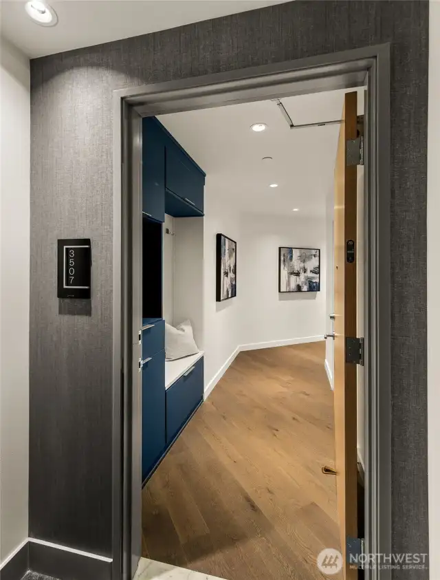 gracious entry with coat closet and landing pad for shoes, keys and more!