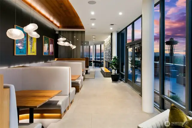 cozy chic owners lounge - decor has our local chillhuly paintingss- how amazing!