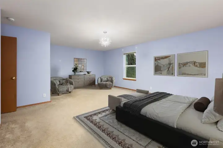 Large primary suite spacious enough for a sitting area
