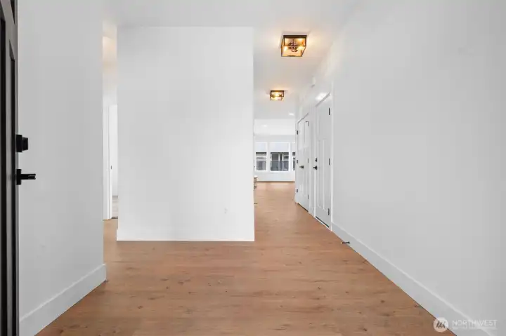Showing the entry with two guest rooms separated from the living area and primary bedroom.