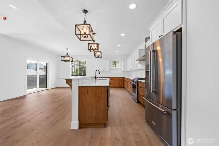Large kitchen and dining area with 10 foot dining and serving bar