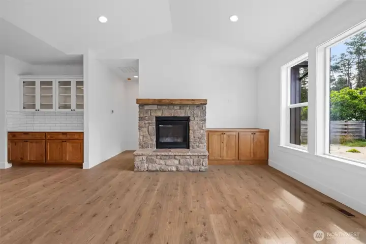 Imagine snuggling in in front of this cosy rock fire place in the living area