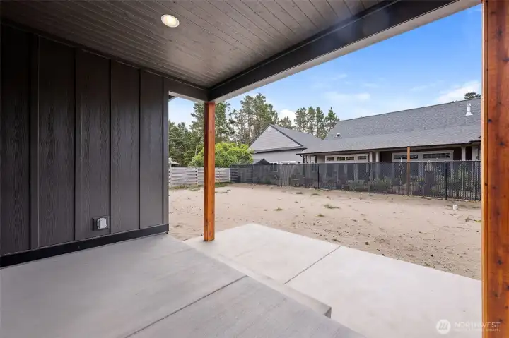 Enjoy outdoors even when it is raining with this covered patio to extend your living space.