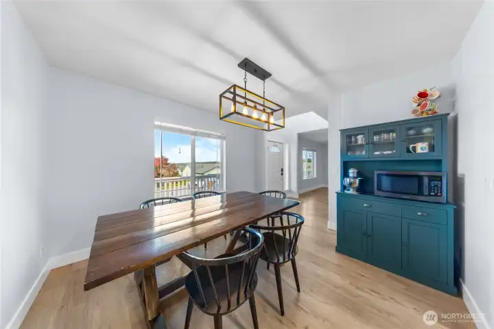 Dining room has plenty of space for a hutch or sideboard.