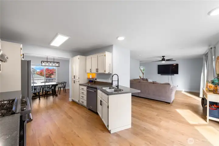 Room for a seat or two at the counter behind sink.