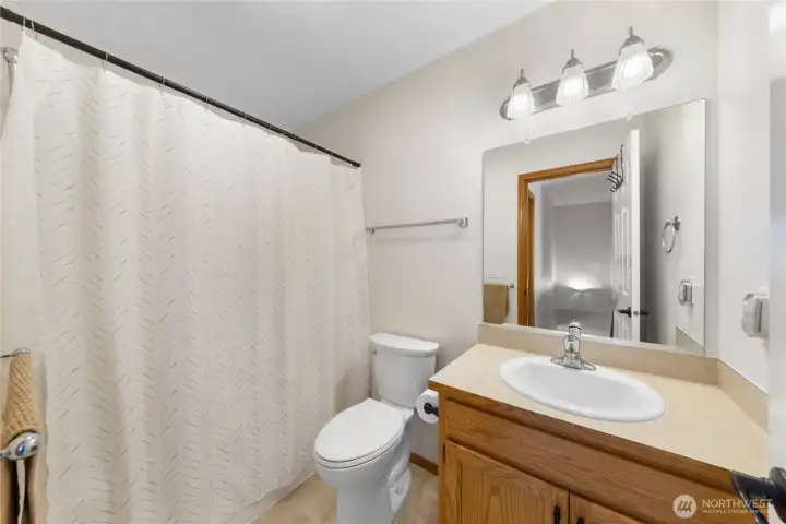 Upstairs Full Bathroom in hallway between bedrooms.
