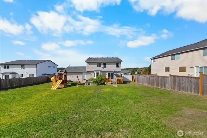 Plenty of space for outdoor living in the fully-fenced back yard.