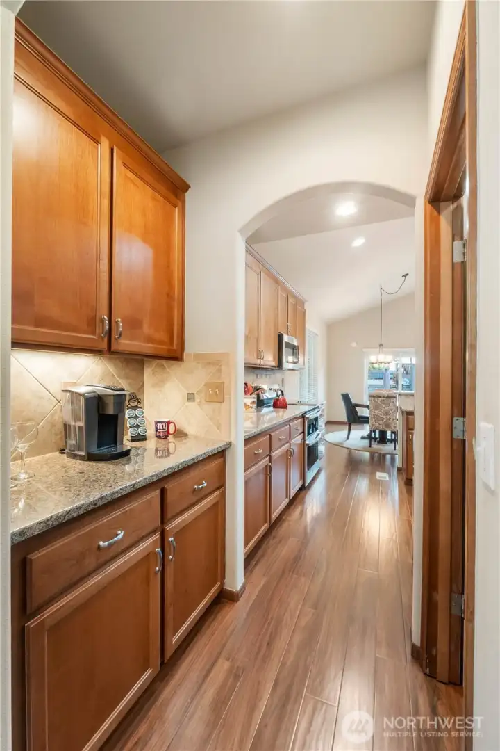 The butlers pantry sits off the dining room and kitchen & creates the perfect coffee or wine bar plus lots of added storage. The generous walk-in panty sits to the right