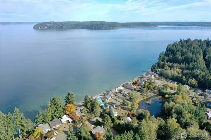 property has a legal access to the hood canal shoreline. Maintained path to the beach is right down the street.