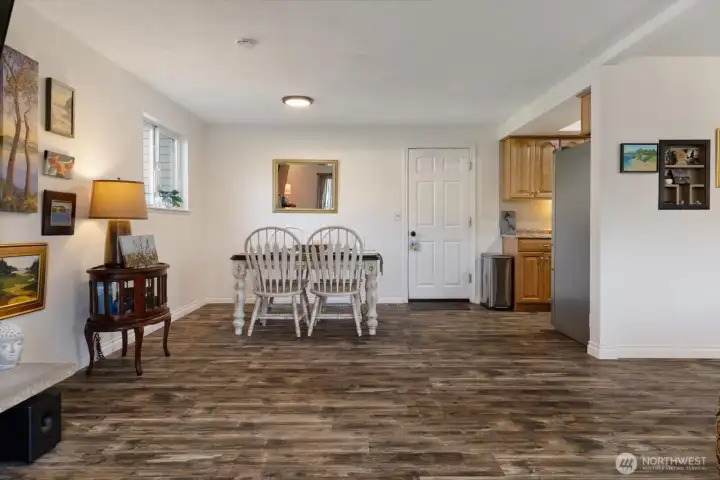 See the flow from kitchen to dining to living room.