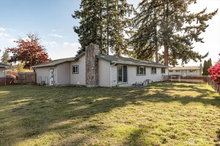 Large fenced backyard with shed and room for Accessory Dwelling Unit.