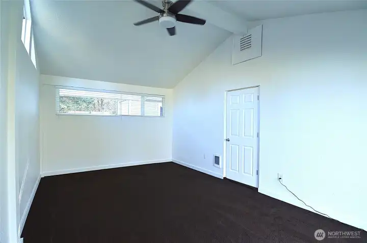 The spacious second bedroom fits multiple beds—perfect for guests or exceptional STR potential!