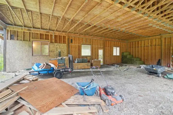 Additional barn interior space offering versatility for storage or livestock use