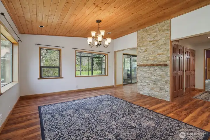 Dining area with wood ceiling and warm finishes