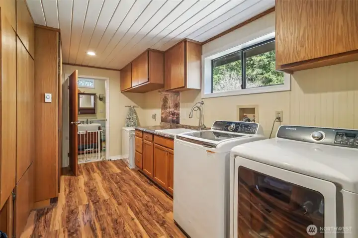Laundry room with additional storage