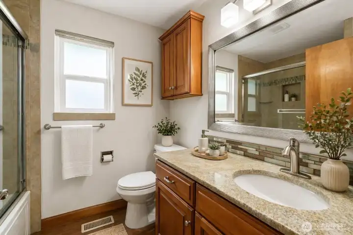 virtual staged main bath with shower and tub