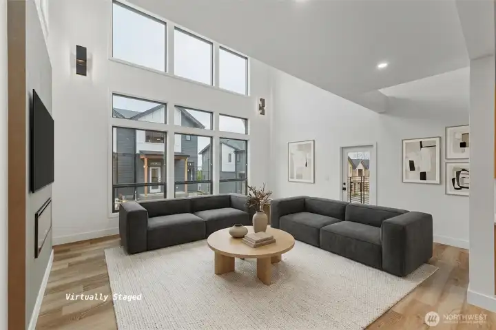 This great room has high ceilings and huge windows to let in a lot of light! This great room has high ceilings and huge windows to let in a lot of light!